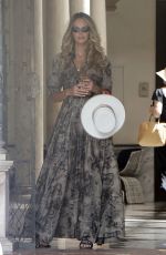 ELLE MACPHERSON Leaves Her Hotel in Seville 06/16/2022