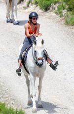 EMMA WATSON Riding a Horse in Ibiza 06/07/2022