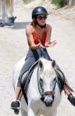 EMMA WATSON Riding a Horse in Ibiza 06/07/2022