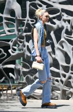 GIGI HADID in Ripped Denim Out in New York 06/24/2022
