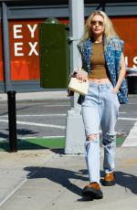 GIGI HADID in Ripped Denim Out in New York 06/24/2022