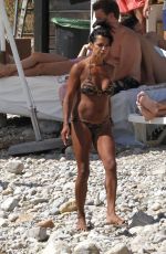 JENNY POWELL in Bikini at a Beach in Ibiza 06/19/2022