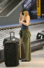 KESHA SEBERT Arrives at JFK Airport in New York 06/20/2022