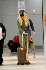 KESHA SEBERT Arrives at JFK Airport in New York 06/20/2022