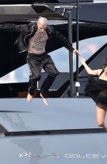 KOURTNEY KARDASHIAN and Travis Barker at a Boat in Portofino 05/24/2022