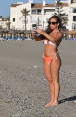 LAURYN GOODMAN in Bikini at a Beach in Marbella 06/21/2022