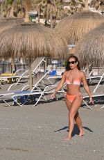 LAURYN GOODMAN in Bikini at a Beach in Marbella 06/21/2022