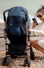 LAURYN GOODMAN Out with Her Baby at a Beach in Brighton 06/01/2022