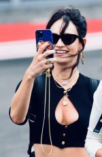 LILY JAMES Boarding a Helicopter with Friends in Glastonbury 06/26/2022