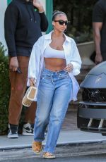 LORI HARVEY Leaves San Vicente Bungalows in West Hollywood 06/20/2022
