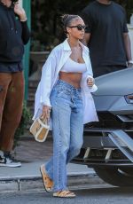 LORI HARVEY Leaves San Vicente Bungalows in West Hollywood 06/20/2022
