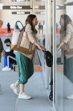 MANDY MOORE Arrives at LAX Airport in Los Angeles 06/06/2022