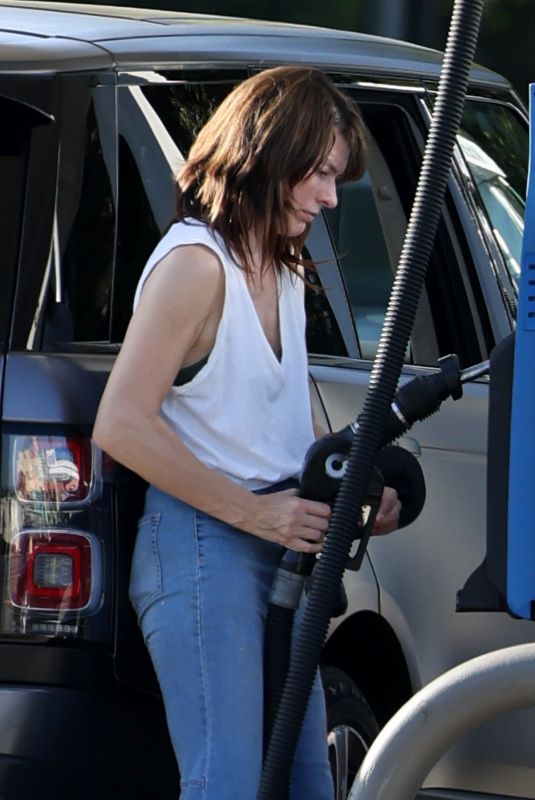 MILLA JOVOVICH ata  Gas Station on Sunset Blvd in West Hollywood 06/13/2022