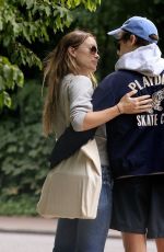 OLIVIA WILDE and Harry Styles Out Kissing in London 06/14/2022