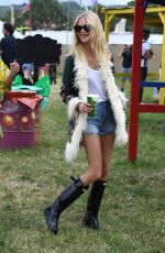 POPPY DELEVINGNE Out at Glastonbury Festival 06/24/2022