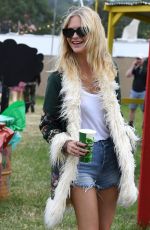 POPPY DELEVINGNE Out at Glastonbury Festival 06/24/2022
