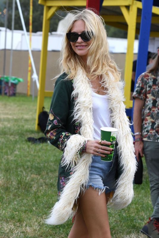 POPPY DELEVINGNE Out at Glastonbury Festival 06/24/2022