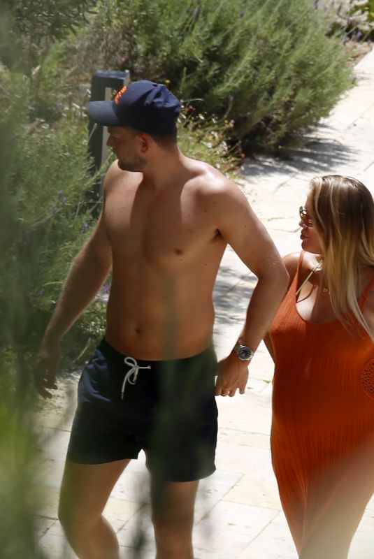 Pregnant LOTTIE TOMLINSON and Lewis Burton on Vacation in Ibiza 06/07/2022