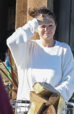 SELENA GOMEZ Buys Duraflame and Firewood in Malibu 06/17/2022