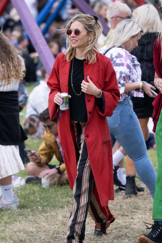 SIENNA MILLER Out and About at Glastonbury Festival 06/24/2022