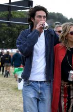 SIENNA MILLER Out at Glastonbury Festival 06/24/2022