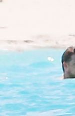 TAYLOR SWIFT in Bikini and Joe Alwyn at a Beach in Bahamas 06/19/2022