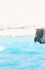 TAYLOR SWIFT in Bikini and Joe Alwyn at a Beach in Bahamas 06/19/2022