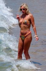 ALEXIS MALONEY in Bikini and Hunter Parr at a Beach in Mykonos 06/29/2022