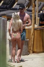 ALEXIS MALONEY in Bikini and Hunter Parr at a Beach in Mykonos 06/29/2022