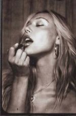 ALEXIS REN at a Photoshoot, July 2022