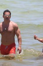 ANGELICA CASTRO in Bikini and Cristian de la Fuente at a Beach in Miami 07/11/2022