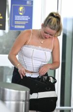 APPLE MARTIN Arrives at JFK Airport in New York 07/02/2022