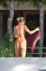 CANDICE SWANEPOEL in Bikini at a Pool in Trancoso 07/18/2022