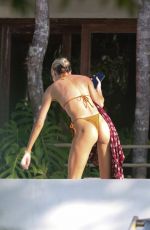 CANDICE SWANEPOEL in Bikini at a Pool in Trancoso 07/18/2022
