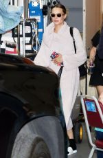 CARA DELEVINGNE Arrives at Live with Kelly and Ryan in New York 07/28/2022