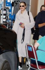 CARA DELEVINGNE Arrives at Live with Kelly and Ryan in New York 07/28/2022