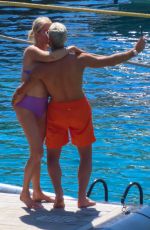 CAROLINE STANBURY in Bikini with Her Husband Sergio Carrallo in Mykonos 07/01/2022