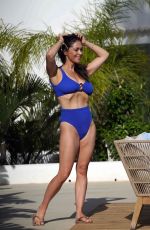 CASEY BATCHELOR in Bikini Filming Her Yoga Fitness App in Marbella 07/11/2022