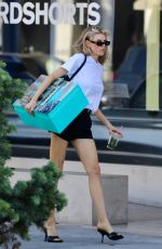 CHARLOTTE MCKINNEY Out Carrying Large Box of Casamigos Tequila 07/26/2022