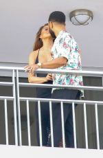 CHRISSY TEIGEN and John Legend on the Balcony of Their Hotel in Nice 07/11/2022