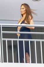 CHRISSY TEIGEN and John Legend on the Balcony of Their Hotel in Nice 07/11/2022