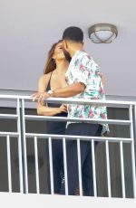 CHRISSY TEIGEN and John Legend on the Balcony of Their Hotel in Nice 07/11/2022