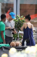 DAKOTA JOHNSON and Chris Martin Out in Boston 07/26/2022