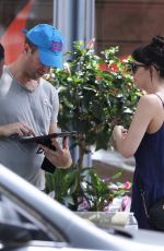 DAKOTA JOHNSON and Chris Martin Out in Boston 07/26/2022