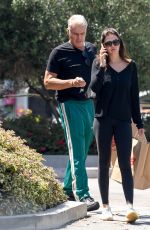 EMMA KROKDAL and Dolph Lundgren Leaves New Balance Store in Santa Monica 07/27/2022