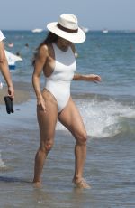 EVA LONGORIA in a White Swimsuit at a Beach in Marbella 07/18/2022