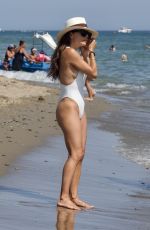 EVA LONGORIA in a White Swimsuit at a Beach in Marbella 07/18/2022