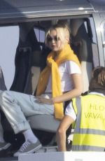 GIGI HADID Leaves a Helicopter on the Roof of a Yacht in Saint-Tropez 07/21/2022
