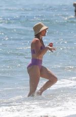 HILARY DUFF in Bikini Paddleboarding in Malibu 07/04/2022