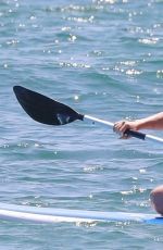 HILARY DUFF in Bikini Paddleboarding in Malibu 07/04/2022